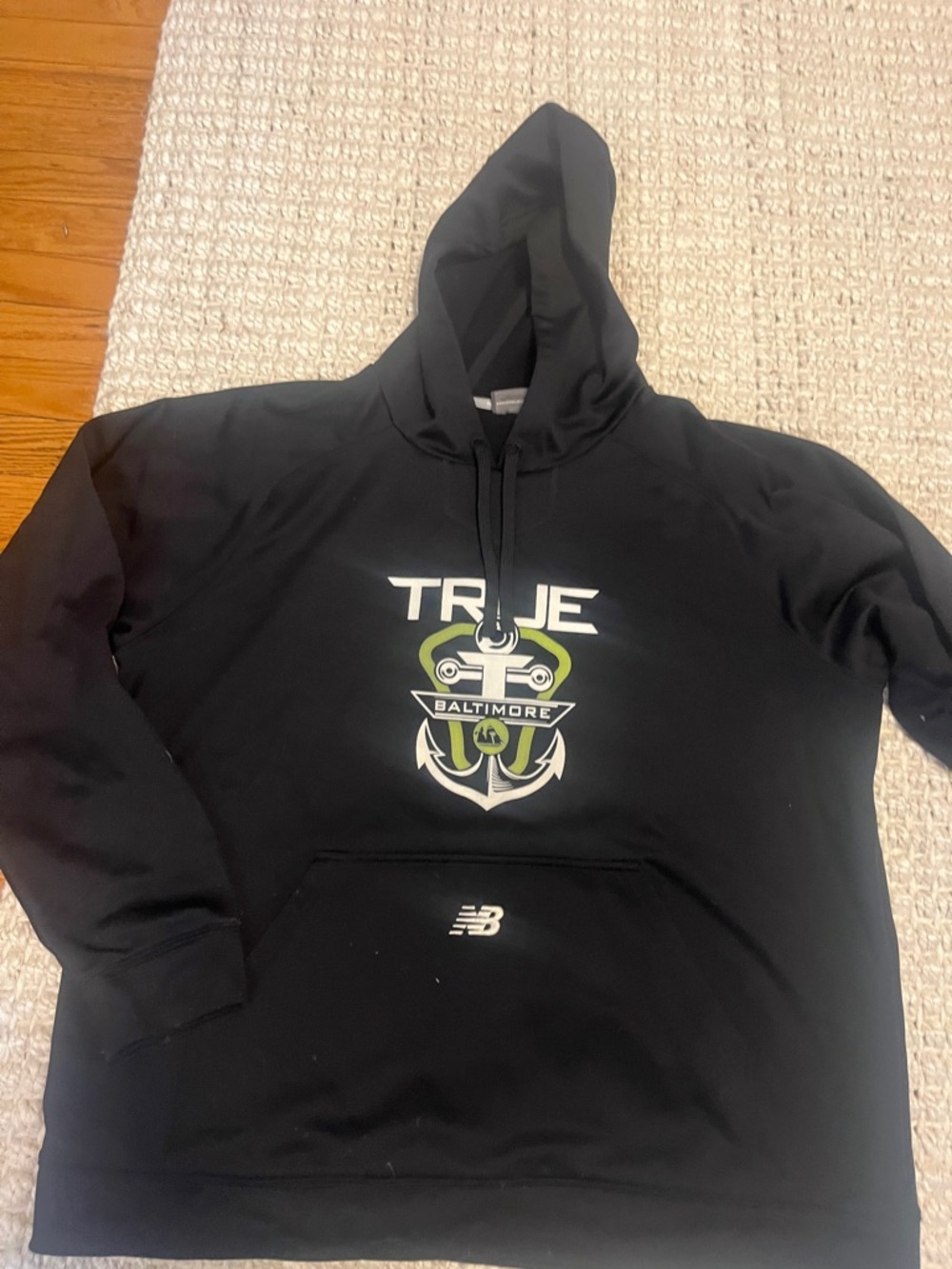 New Balance Black Hoodie with Anchor Graphic and Green Accents